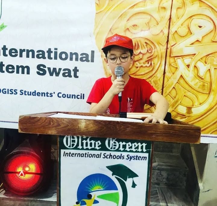 Student receiving a trophy