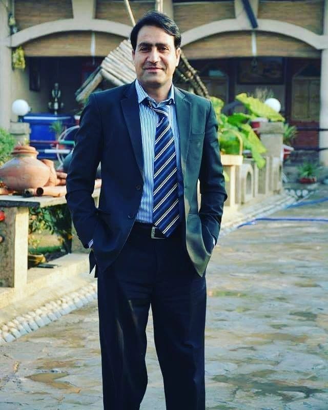 Dr. Nisar Ahmad Khan, Director of Olive Green International Schools System