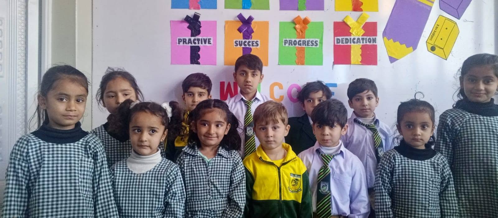 Primary students at the welcome board