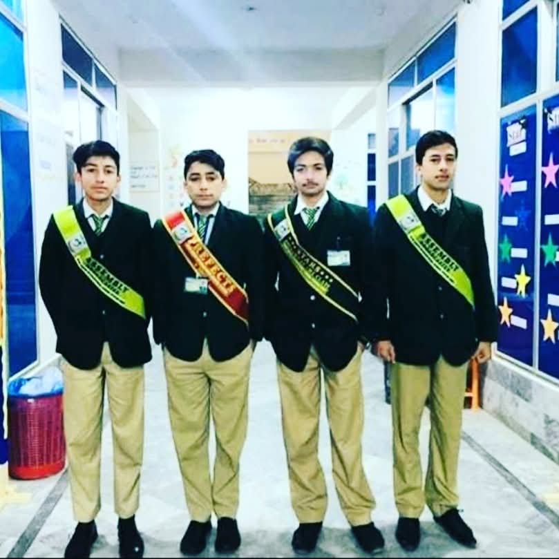 Olive Green International Schools System student council members in uniform